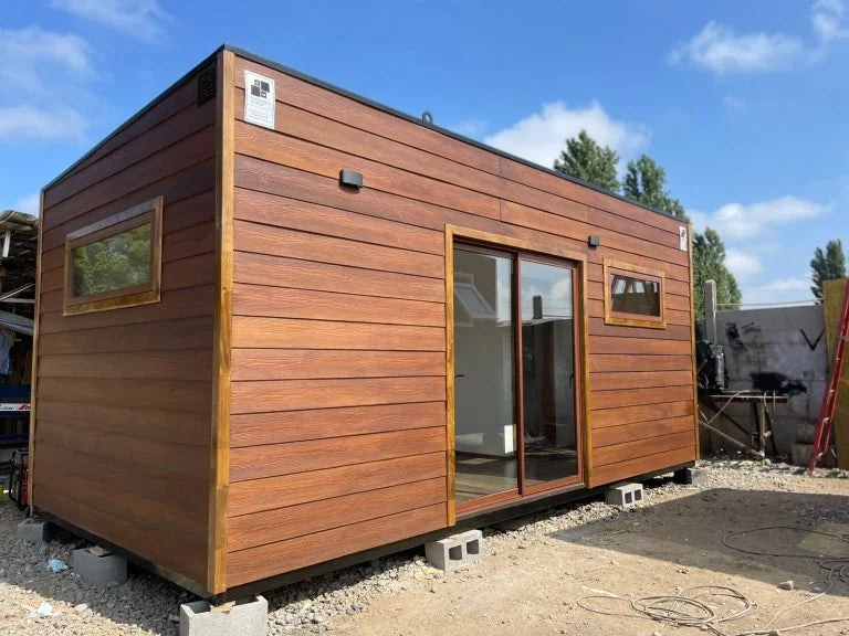 Cabine modulaire design 18 m² avec finitions premium noir mat