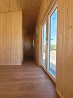 Module habitable polyvalent mobile 15,5 m² avec intérieurs bois et salle de bain – photo 7